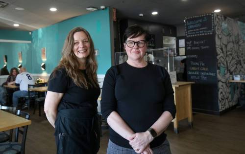 Ruth Bonneville / Free Press
                                Oakwood Cafe owner Wendy May, with longtime server is Kendra Menard, in the restaurant Friday. The Oakwood Cafe is closing after over 30 years because the restaurant lost its financial footing during the pandemic and was never able to fully recover.