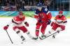 Roman Koksarov / RKF Milan Italy
                                Denmark&rsquo;s Nikolaj Ehlers (left) and teammate Oliver Bjorkstrand (right) battle for the puck against Czechia&rsquo;s Martin Necas Tuesday during the Milan Cortina men&rsquo;s hockey play-in game.