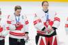 NATHAN DENETTE / THE CANADIAN PRESS
                                Canada&rsquo;s Marie-Philip Poulin (29) and goalie Ann-Renee Desbiens (35) gets their silver medals after losing to USA during overtime of the women&rsquo;s gold medal hockey game.