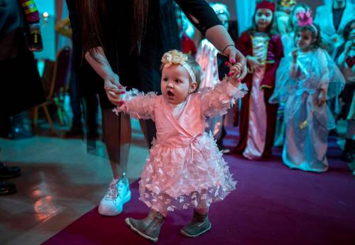 Mindaugas Kulbis / The Associated Press files
                                A girl attends a Jewish festival of Purim celebration at a synagogue in Vilnius, Lithuania, in March 2022.