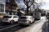 Police vehicles are shown outside the scene of a Langside Street home where five people were shot. (Aaron Vincent Elkaim / The Canadian Press files)