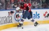 United States' Haley Winn (8) and Canada's Brianne Jenner (19) battle for the puck during third period Rivalry Series action in Edmonton on Saturday, Dec. 13, 2025. THE CANADIAN PRESS/Jason Franson