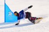 Ben Heldman, from Toronto, Ont., races in the men's snowboarding parallel giant slalom qualification at the Milano Cortina 2026 Winter Olympic Games in Livigno, Italy on Sunday, Feb. 8, 2026. THE CANADIAN PRESS/Sean Kilpatrick