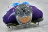 Ukraine's Vladyslav Heraskevych starts for a men's skeleton training session at the 2026 Winter Olympics, in Cortina d'Ampezzo, Italy, Monday, Feb. 9, 2026. (AP Photo/Alessandra Tarantino)