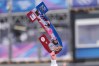 Friends and family hold a sign for United States' Jaelin Kauf before the women's freestyle skiing moguls qualifications at the 2026 Winter Olympics, in Livigno, Italy, Tuesday, Feb. 10, 2026. (AP Photo/Lindsey Wasson)