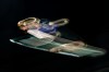 Giovanni Bresadola, of Italy, soars through the air during the ski jumping mixed team competition at the 2026 Winter Olympics, in Predazzo, Italy, Tuesday, Feb. 10, 2026. (AP Photo/Matthias Schrader)