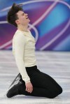 Maxim Naumov of the United States competes during the men's figure skating short program at the 2026 Winter Olympics, in Milan, Italy, Tuesday, Feb. 10, 2026. (AP Photo/Francisco Seco)