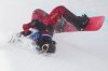 China's Liu Jiayu crashes during the women's snowboarding halfpipe qualifications at the 2026 Winter Olympics, in Livigno, Italy, Wednesday, Feb. 11, 2026. (AP Photo/Lindsey Wasson)