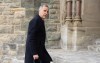 Prime Minister Mark Carney speaks with photographers as he arrives on Parliament Hill in Ottawa on Tuesday, Feb. 10, 2026. THE CANADIAN PRESS/Adrian Wyld