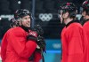 Team Canada captain Sidney Crosby, left, talks with forward Connor McDavid as they take part in practice during the 2026 Milan Cortina Winter Olympics in Milan, Italy on Sunday, Feb. 8, 2026. THE CANADIAN PRESS/Nathan Denette