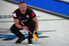 Canada's Brad Jacobs in action during the men's curling round robin session against Germany, at the 2026 Winter Olympics, in Cortina d'Ampezzo, Italy, Wednesday, Feb. 11, 2026. (AP Photo/Misper Apawu)