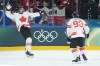 Mark Stone (61) of Team Canada celebrates a goal with Mitch Marner (93) against Team Czechia during second period men's Olympic hockey action at the 2026 Milan Cortina Winter Olympics in Milan, Italy on Thursday, February 12, 2026. THE CANADIAN PRESS/Nathan Denette