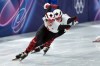 Canada's Courtney Sarault (14) and Florence Brunelle (8) compete in the women's 500 metre short track speedskating quarterfinals at the 2026 Winter Olympics, in Milan, on Thursday, Feb. 12, 2026. THE CANADIAN PRESS/Darryl Dyck
