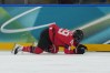 Canadian forward Marie-Philip Poulin (29) after taking a hit against Czechia in women's hockey at the 2026 Milan Cortina Winter Olympics in Milan on Monday, Feb. 9, 2026. (AP Photo/Carolyn Kaster)