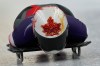 Canada's Hallie Clarke starts for a women's skeleton training session at the 2026 Winter Olympics, in Cortina d'Ampezzo, Italy, Tuesday, Feb. 10, 2026. (AP Photo/Aijaz Rahi)