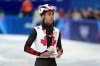 Canada's William Dandjinou finishes fourth after competing in the men's 1,000 metre short track speedskating finals at the 2026 Winter Olympics, in Milan, on Thursday, February 12, 2026. THE CANADIAN PRESS/Darryl Dyck