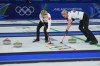 Canada's Emma Miskew (right) and Tracy Fleury in action during the women's curling round-robin session against Britain at the 2026 Winter Olympics in Cortina d'Ampezzo, Italy, on Feb.14, 2026. (AP Photo/Fatima Shbair)