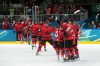 Canada players celebrate the team's 5-1 win over Germany following the third period of a women's hockey quarterfinal game at the 2026 Winter Olympics, in Milan, Saturday, Feb. 14, 2026. THE CANADIAN PRESS/Darryl Dyck