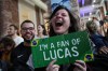 Supporters of Brazil's Lucas Pinheiro Braathen react at the Brazil House as he wins the men's giant slalom at the 2026 Winter Olympics, in Milan, Italy, Saturday, Feb. 14, 2026. (AP Photo/Antonio Calanni)