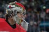 Denmark's goalkeeper Mads Sogaard looks on during a preliminary round match of men's ice hockey between United States and Denmark at the 2026 Winter Olympics, in Milan, Italy, Saturday, Feb. 14, 2026. (AP Photo/Petr David Josek)