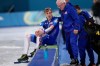 Jordan Stolz of the U.S. and coach Bob Corby talk after the men's 1,000 meters speedskating race at the 2026 Winter Olympics, in Milan, Italy, Wednesday, Feb. 11, 2026. (AP Photo/Luca Bruno)