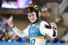 Anna Odine Stroem, of Norway, reacts after winning the gold medal in the ski jumping women's large hill individual at the 2026 Winter Olympics, in Predazzo, Italy, Sunday, Feb. 15, 2026. (AP Photo/Matthias Schrader)