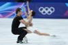 Canada's Lia Pereira and Trennt Michaud compete during the pairs free skate figure skating event at the 2026 Winter Olympics, in Milan, on Monday, Feb. 16, 2026. THE CANADIAN PRESS/Darryl Dyck