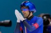 Andrea Giovannini of Italy gestures after his team won the gold medal in the final of the men's team pursuit speedskating race at the 2026 Winter Olympics, in Milan, Italy, Tuesday, Feb. 17, 2026. (AP Photo/Ben Curtis)