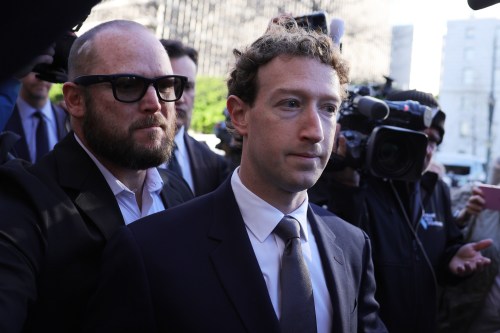 Meta CEO Mark Zuckerberg arrives for a landmark trial over whether social media platforms deliberately addict and harm children, Wednesday, Feb. 18, 2026, in Los Angeles. (AP Photo/Ryan Sun)