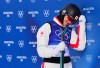 Canada's Marion Thénault reacts after her second jump as she competes in women's freestyle skiing aerials at the Milano Cortina 2026 Winter Olympic Games in Livigno, Italy, Wednesday, Feb. 18, 2026. THE CANADIAN PRESS/Sean Kilpatrick
