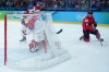 Canada's Mitch Marner (93) scores the game-winning goal in overtime against Czechia goalie Lukas Dostal (1) in a quarterfinal men's hockey game at the 2026 Winter Olympics, in Milan, on Wednesday, Feb. 18, 2026. THE CANADIAN PRESS/Darryl Dyck