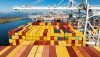 FILE - Cargo containers line a ship at the Port of Oakland on Wednesday, Aug. 6, 2025, in Oakland, Calif. (AP Photo/Noah Berger, File)