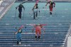 Athletes, including Italy's Alba de Silvestro, bottom left, compete during a ski mountaineering women's sprint heat, at the 2026 Winter Olympics, in Bormio, Italy, Thursday, Feb. 19, 2026. (AP Photo/Gabriele Facciotti)