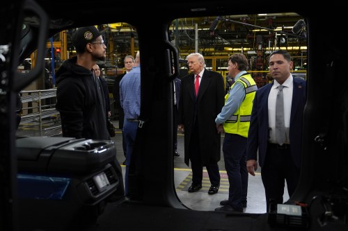 U.S. President Donald Trump listens during a tour of the Ford River Rogue complex on Tuesday, Jan. 13, 2026, in Dearborn, Mich. (AP Photo/Evan Vucci)