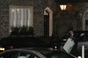 A person leaves the home of Peter Mandelson in north west London, Friday, Feb. 6, 2026 as British police are searching two properties linked to ex-ambassador Peter Mandelson as part of probe into potential misconduct stemming from his ties to the late Jeffrey Epstein.(AP Photo/Thomas Krych)