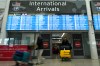 International passengers arrive at Pearson International Airport in Toronto, Ont. on Wednesday, Feb. 11, 2026. U.S. sanctions preventing oil from getting to Cuba have caused jet fuel shortages and flight delays from the Caribbean nation. THE CANADIAN PRESS/Jon Blacker