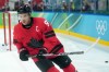 Canada forward Connor McDavid (97) warms up prior to first period Men's Olympic semi final ice hockey action at the 2026 Milan Cortina Winter Olympics in Milan, Friday, Feb. 20, 2026. THE CANADIAN PRESS/Nathan Denette