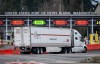 A truck drives past the passenger entry point at the U.S. and Canada border in Surrey B.C., on Tuesday, March 4, 2025. THE CANADIAN PRESS/Ethan Cairns