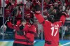 Canada forward Nathan MacKinnon (29) celebrates his goal with Canada forward Sam Reinhart (13) and Canada forward Macklin Celebrini (17) during third period men's Olympic semifinal hockey action at the 2026 Milan Cortina Winter Olympics in Milan, Italy on Friday, Feb. 20, 2026. THE CANADIAN PRESS/Nathan Denette