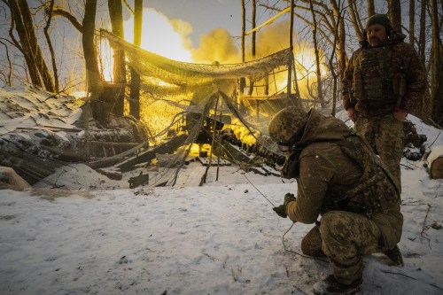 Ukrainian soldiers of the 48th separate artillery brigade fire at Russian positions on the front line in Kharkiv region, Ukraine on Wednesday, Feb. 18, 2026. (AP Photo/Andrii Marienko)