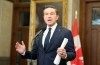 Conservative leader Pierre Poilievre speaks in the Foyer of the House of Commons in Ottawa, Tuesday, Feb. 17, 2026. THE CANADIAN PRESS/Adrian Wyld