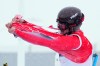 Canada's Reece Howden rips off his bib after being eliminated during the men's skicross quarterfinals at the Milano Cortina 2026 Winter Olympic Games in Livigno, Italy on Saturday, Feb. 21, 2026. THE CANADIAN PRESS/Sean Kilpatrick