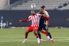 Atletico Ottawa's Ballou Tabla (13) fights for the ball with Nashville SC's Bryan Acosta (6) during round one of the 2026 CONCACAF Champions Cup in Hamilton, Tuesday, Feb. 17, 2026. THE CANADIAN PRESS/Nick Iwanyshyn