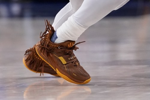 FILE - The tassels on Dallas Mavericks guard Kyrie Irving wave as he participates during the second half in Game 3 of the NBA basketball finals against the Boston Celtics, Wednesday, June 12, 2024, in Dallas. (AP Photo/Tony Gutierrez, File)