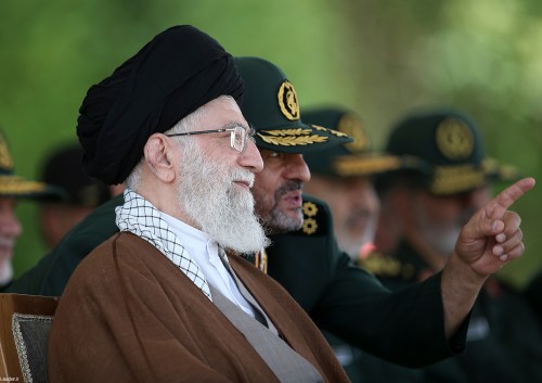 FILE- In this picture released by the official website of the office of the Iranian supreme leader, Supreme Leader Ayatollah Ali Khamenei listens to the then commander of the Revolutionary Guard Mohammad Ali Jafari during a graduation ceremony of a group of the guard's officers in Tehran, Iran, May 20, 2015. (Office of the Iranian Supreme Leader via AP, File)