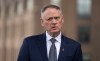 Defence Minister David McGuinty speaks with reporters in Sydney, Australia, Tuesday, March 3, 2026. THE CANADIAN PRESS/Adrian Wyld