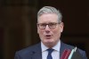 Britain's Prime Minister Keir Starmer leaves 10 Downing Street to attend the weekly Prime Ministers' Questions session in the parliament in London, England, Wednesday, March 4, 2026. (AP Photo/Kin Cheung)