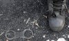 Canadians in Puerto Vallarta, Mexico, are being ordered to shelter in place as violence escalates in the region. Handcuffs, a boot and some keys lay on the ground at the site where a criminal gang ambushed a police convoy near the town of Soyatlan, near Puerto Vallarta, Mexico, Tuesday, April 7, 2015. The fatal attack happened late Monday as the convoy traveled on a rural road between the Pacific coast resort of Puerto Vallarta and Guadalajara, the state capital, the Jalisco state prosecutors' office said. (AP Photo)