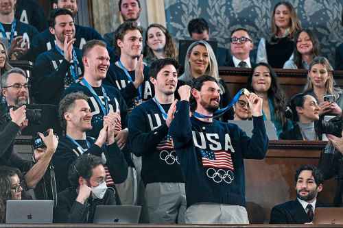 Members of the United States' Olympic hockey team, goalie Connor Hellebuyck in front, attend President Donald Trump's State of the Union address to a joint session of Congress in the House chamber at the U.S. Capitol in Washington, Tuesday, Feb. 24, 2026. (Kenny Holston/The New York Times via AP, Pool)