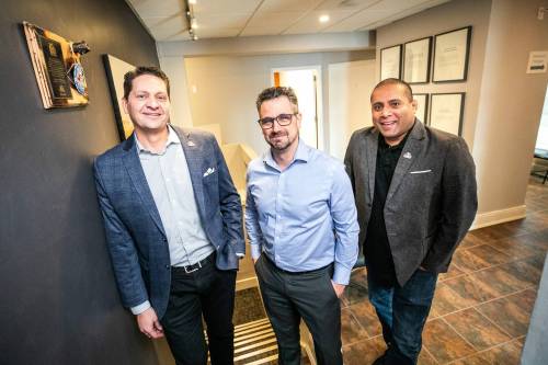 MIKAELA MACKENZIE / FREE PRESS
                                Christian Dandeneau (CEO, left), Robert Pich (director of professional services) and Jerin Valel (COO) at ID Fusion Software Inc. on Monday, Feb. 23, 2026. For Aaron story. Free Press 2026